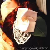 Tocado de novia de origami y encaje